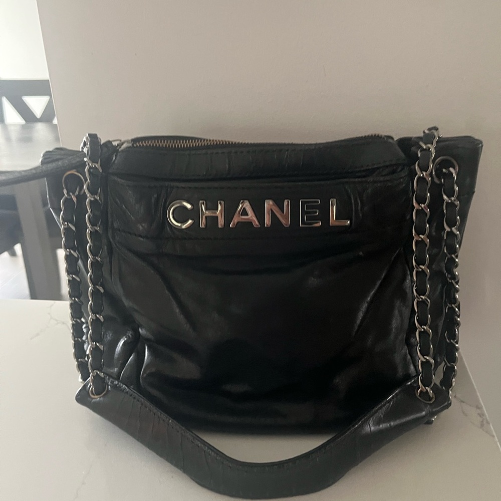 CHANEL Black Leather Handbag with Silver Details